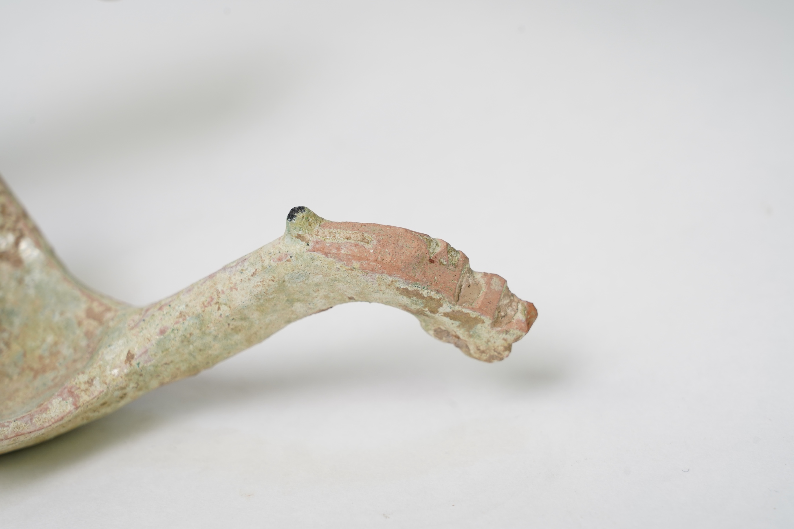 A Chinese earthenware scoop and a similar ladle, Han Dynasty (1st-2nd century A.D.)